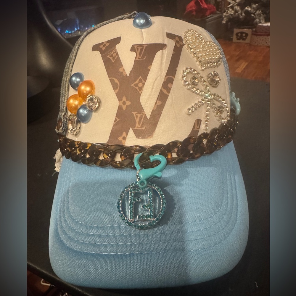 Elegant Powder Blue Trucker Cap embellished with hues of brown,coral & blue